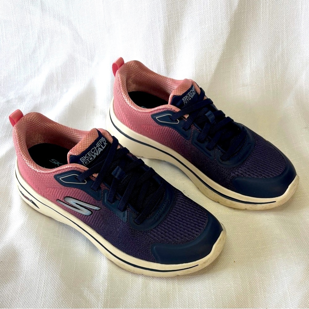 Like new Skechers Women's Navy and Pink Sneakers, only wear once .